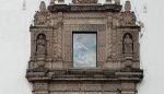 San Pedro, façade, second story choir loft window, reliefs & sculpture