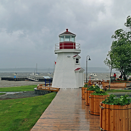 Stormy whitecaps show off their pearly whites along the Kennebecasis river at Renforth wharf & lighthouse.