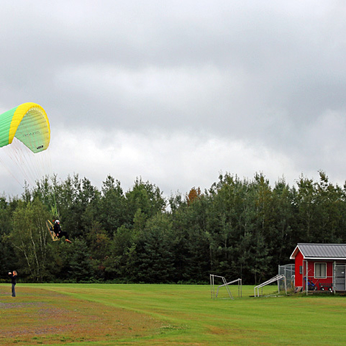 A powered paraglider lifts off during the Sussex International Balloon Fiesta in Sussex, NB, Canada.