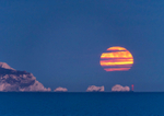 March - Supermoon rising over the Needles