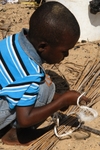 Senegal Fulani Senegal village boy making basket 5 detailo