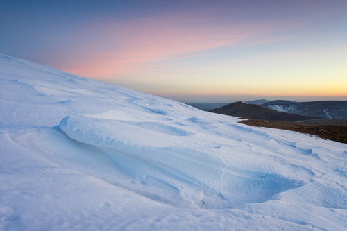 Snow drift patterns on Beinn-y-Phott at sunset.