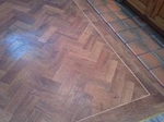 AP02 Auburn Oak Parquet in herring bone effect