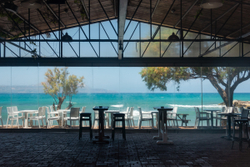 Empty chairs at empty tables
