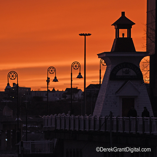 Vivid sunset over Saint John Harbor and as POVed from along the boardwalk.