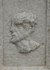 Façade portal, right pillar base relief (inner right)