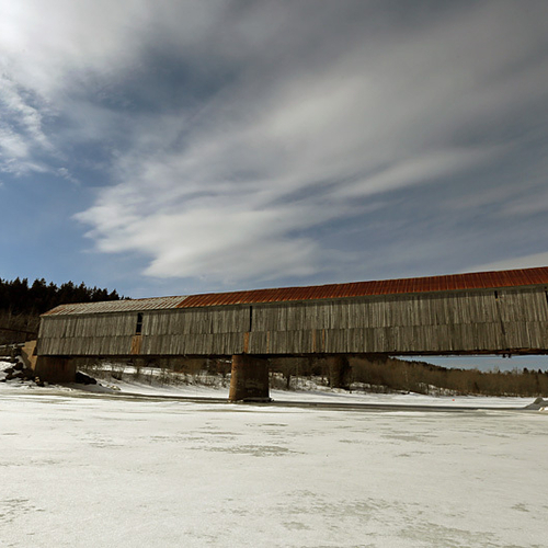 The Milkish Inlet Covered Bridge #1 is situated on the Kingston Peninsula at Bayswater, Kings County, Canada. This ci…