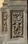 San Gabriel, façade, main portal, left pilaster bases relief