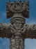 Façade roof cross, head & face of Christ