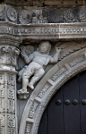 South portal, left spandrel cherub