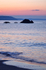 Looe Beach just before sunrise in portrait view