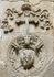 Large cloister, lower walk spandrel insignia