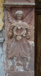Façade portal, left pilaster relief, archangel