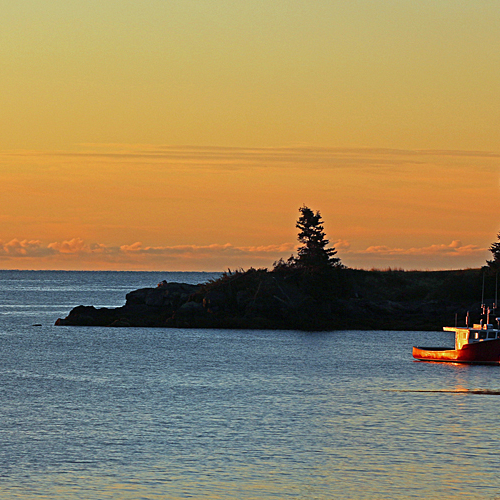 The entrance to Beaver Harbour, Charlotte County, New Brunswick, Canada can be seen here at sunrise with Lighthouse P…