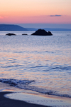 Looe Beach just before sunrise in portrait view