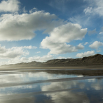 Sand reflections and spray, Muriwai