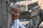 Femal  monk at Bayon Temple near Angkor Wat