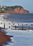 The waves roll in on Teignmouth Beach in Devon