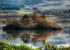 Eilean Freoch, a small island on Loch Awe bathed in autumn sunshine