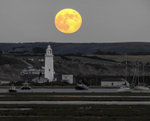 Strawberry Supermoon rising over Hurst Castle - 1