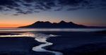 Sunset over isle of Rhum from Eigg
