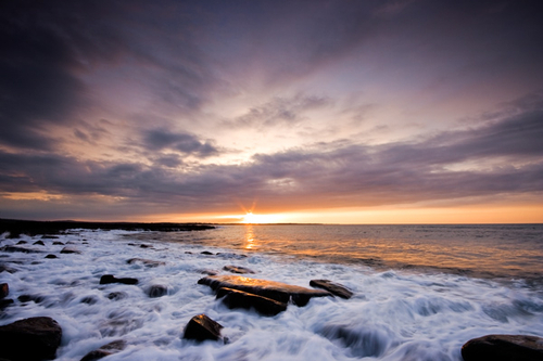 In amongst the breaking waves at Port St. Mary point as the Sun rises over Castletown. Almost resulted in an early mo…