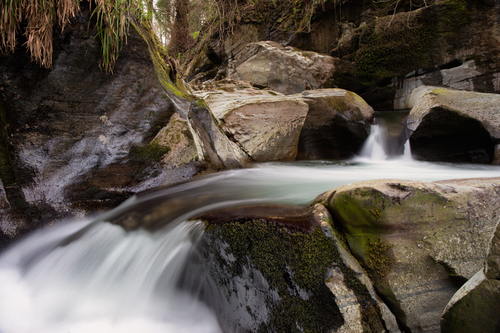 Cool, clear, Spring time water makes it way through one of the deeper pools at Ballaglass Glen.