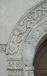 Façade portal, archivolt detail (left)