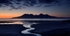 Sunset over isle of Rhum from Eigg