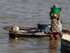 Senegal Lac Rose salt production 10 woman carrying salt from boat to s