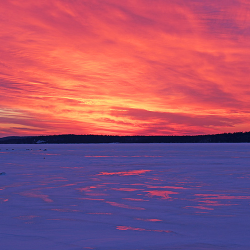 Sunset falls over the Kennebecasis Bay at picturesque Rothesay, New Brunswick. Often frozen/suspended particulate fro…