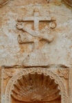 San Francisco, façade portal, pediment niche, Franciscan insignia
