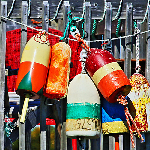 A buoy collection on a deck in Grand Manan.