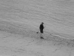 Boy & Pigeon, Thames Beach (b&w)
