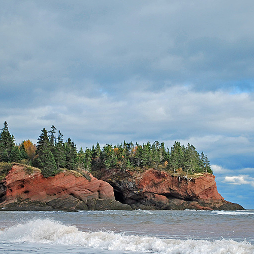 Of triassic aged rock, the sea caves have been sculpted & shaped for ages by the Bay of Fundy waters, the highest tid…
