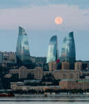 Flame towers moonset