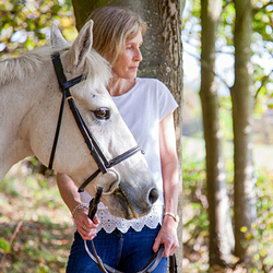 lady & grey pony in woods