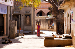 Carrying bricks Chatra Sagar village