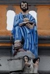Façade, parapet sculpture (left), St. Luke