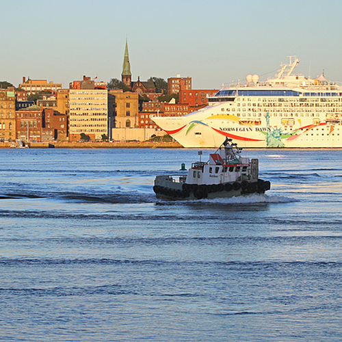The Saint John Waterfront with cruise ship, spires and buildings of the old city.