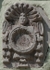 La Inmaculada Concepción, façade portal, left spandrel relief