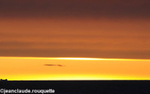 Sunset and iceberg in Baffin's sea