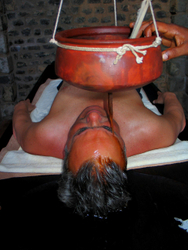 AAyurvedic oil treatment at Suya Samudra Spa - Kerala