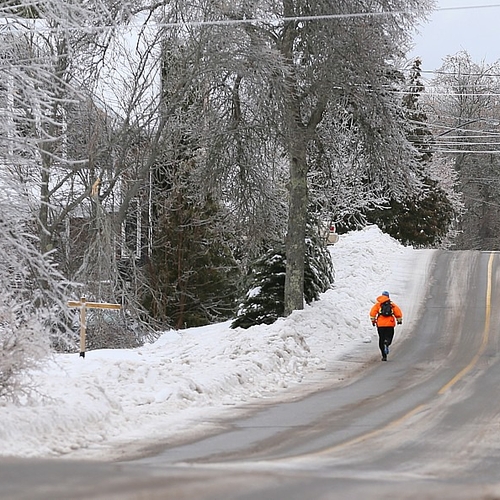 A jogger braves Jack Frost's icy world.