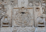 Façade, choir loft window relief, Spanish coat of arms