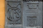 Porciúncula portal, left pilaster reliefs