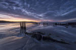 Sunrise Reflected On Harbour View Beach