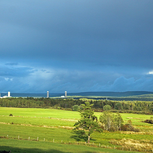 Sun breaks through late afternoon storm clouds and illuminates prime farmland within the Kennebecasis valley near Sus…
