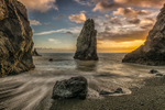 Sunset at Hidden Cove at Copper Coast Drive, Ireland.