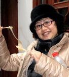 China Shanghai Zhu Jia Jiao water town girl with toffee sweet